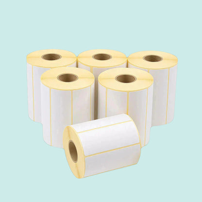 Six rolls of label paper on a white background